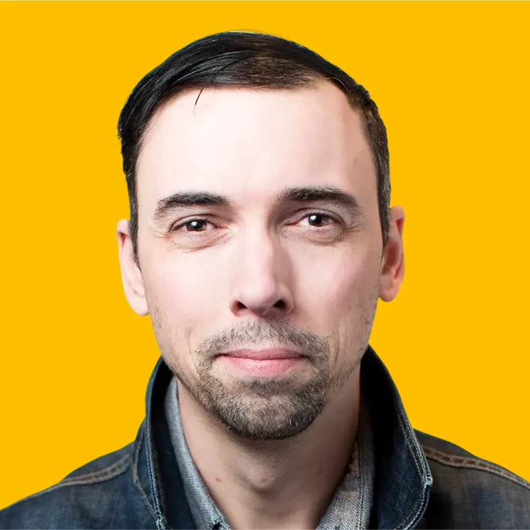 Clint's headshot against a yellow background