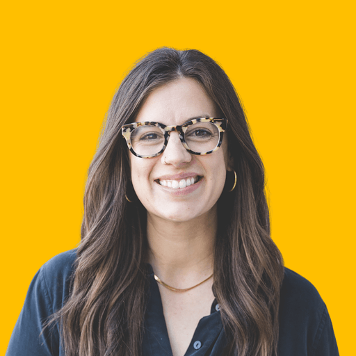 Elaine's headshot against a yellow background