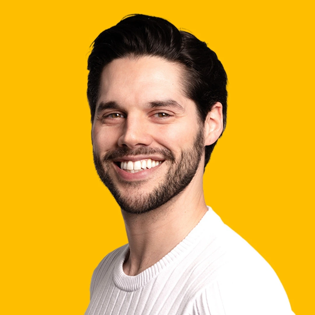 David's headshot against a yellow background