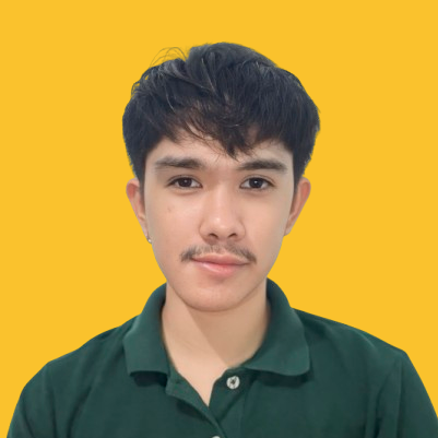 KK B's headshot against a yellow background