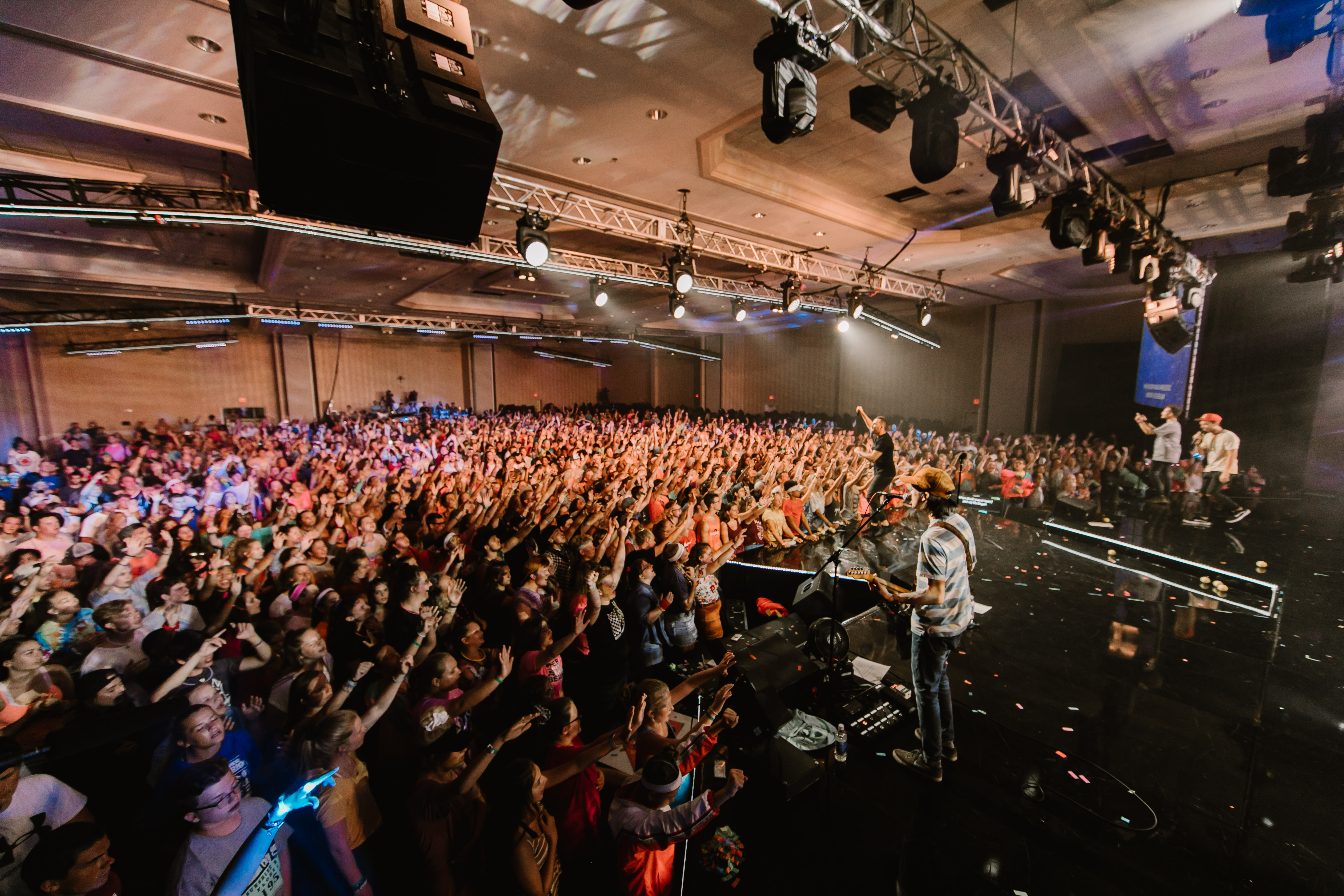 Teen students worshiping at Christian summer camp