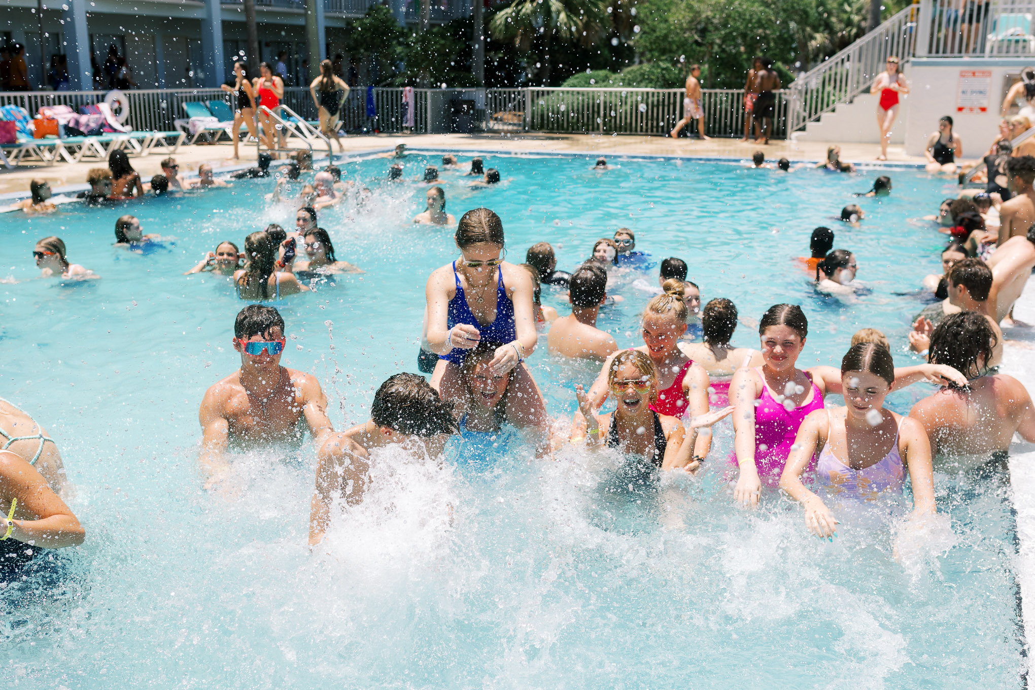 Students splashing in the ocean