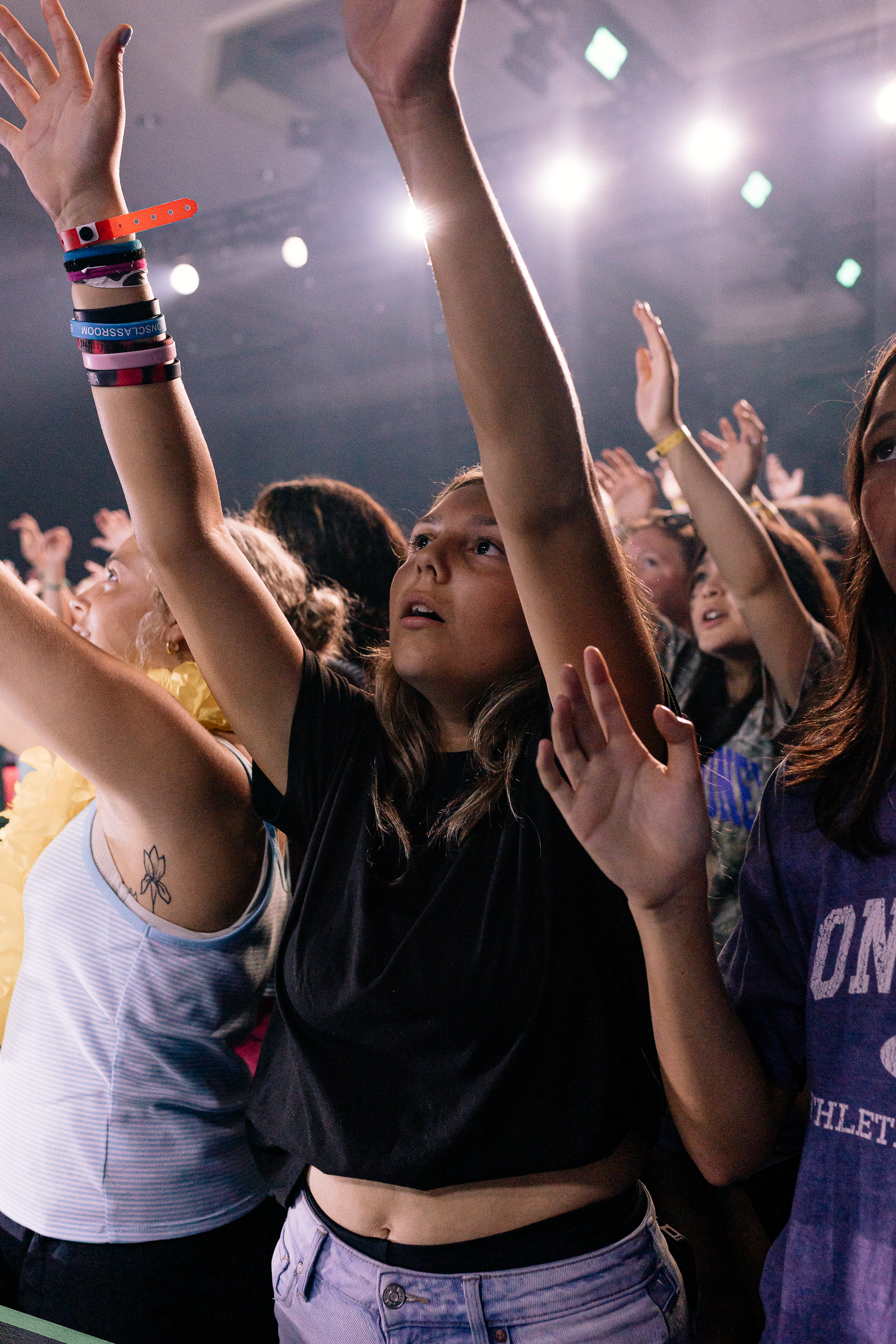 Students respond during a BigStuf worship session