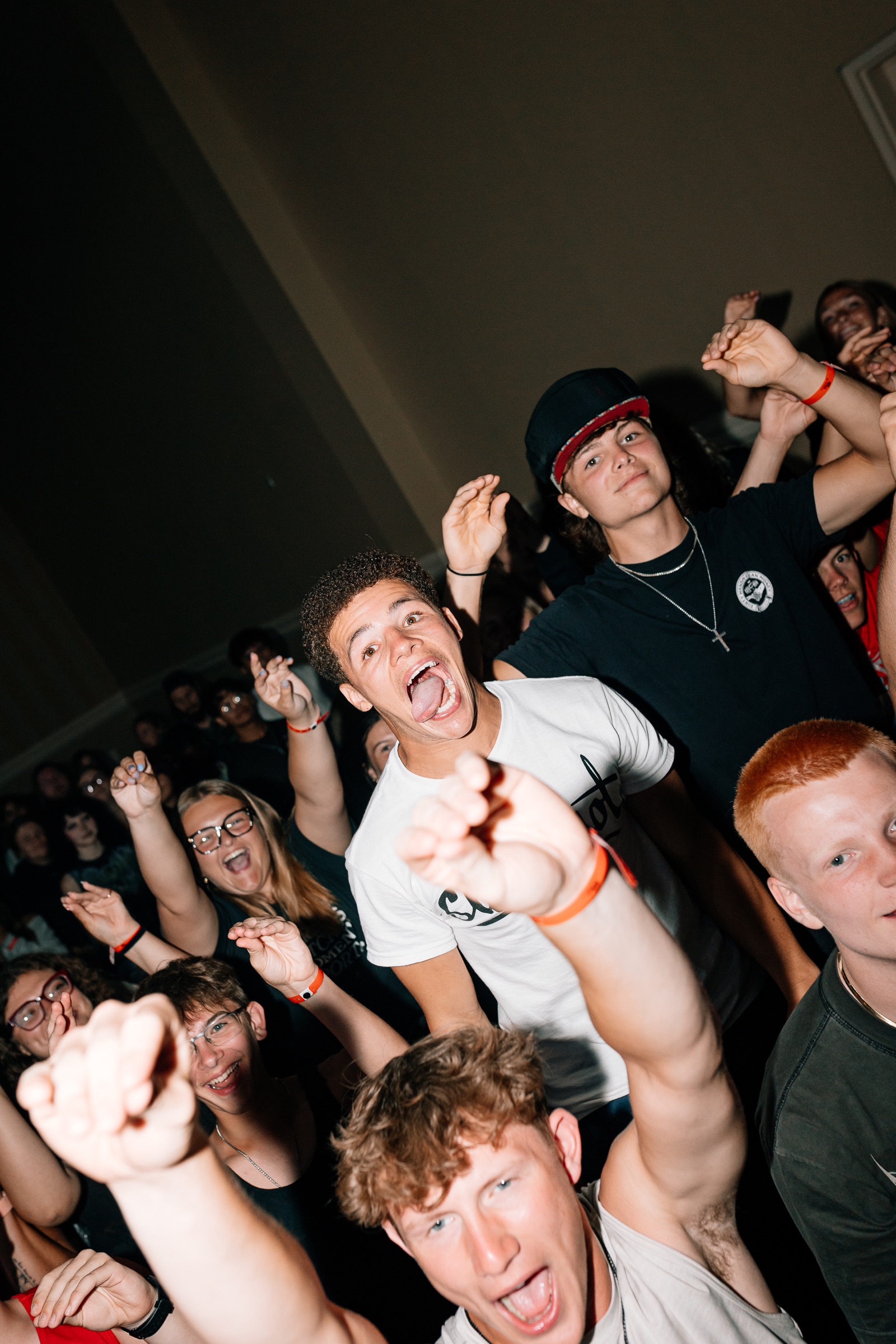 Students respond during an indoor BigStuf 2026 worship session