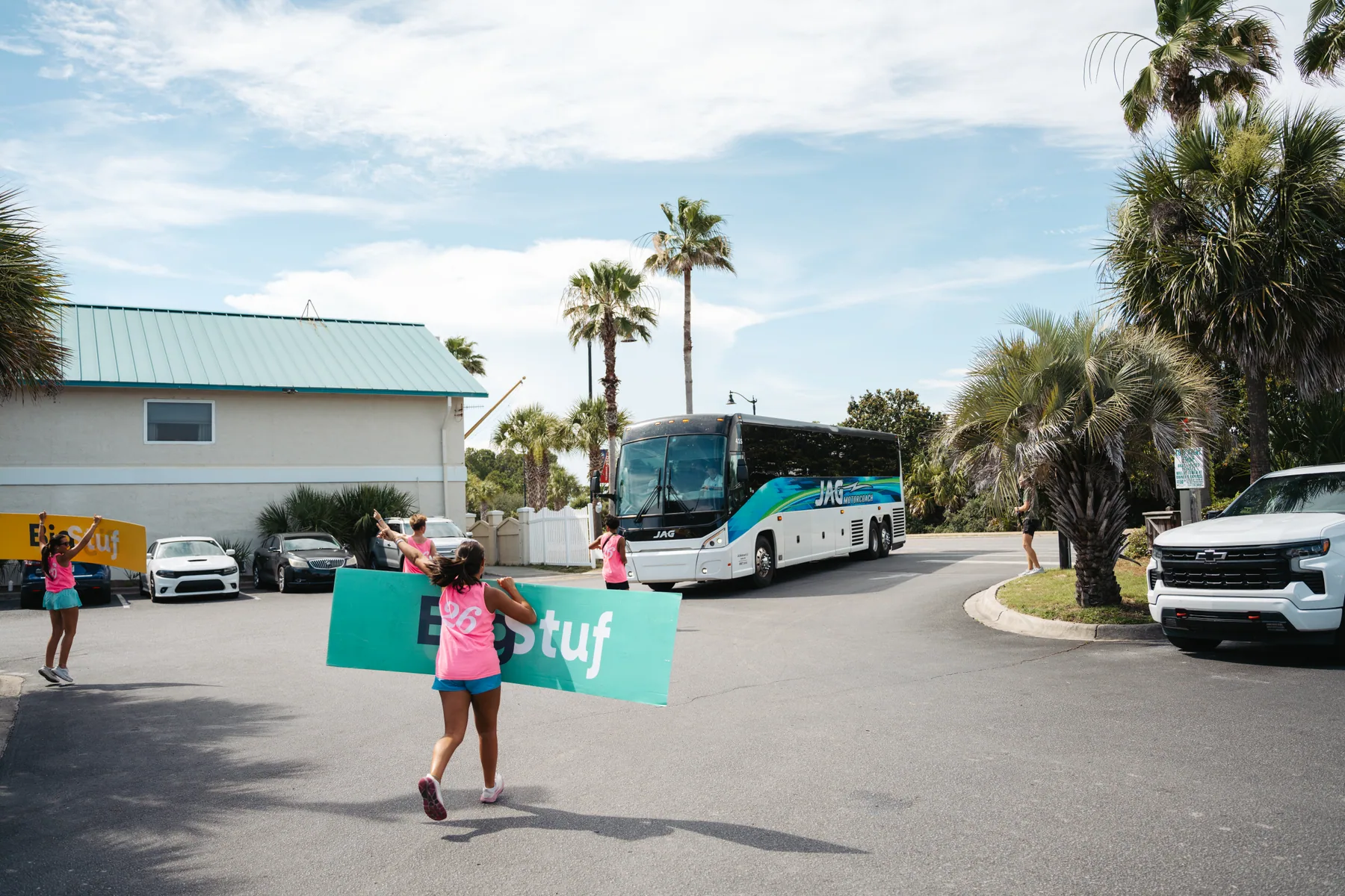 BigStuf interns directing an arriving camp bus and welcoming groups