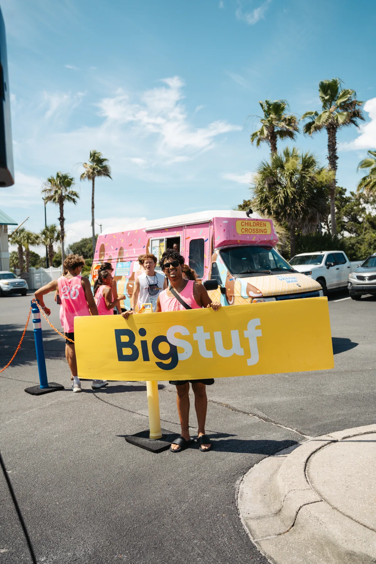 BigStuf team unloading luggage and equipment from a camp bus