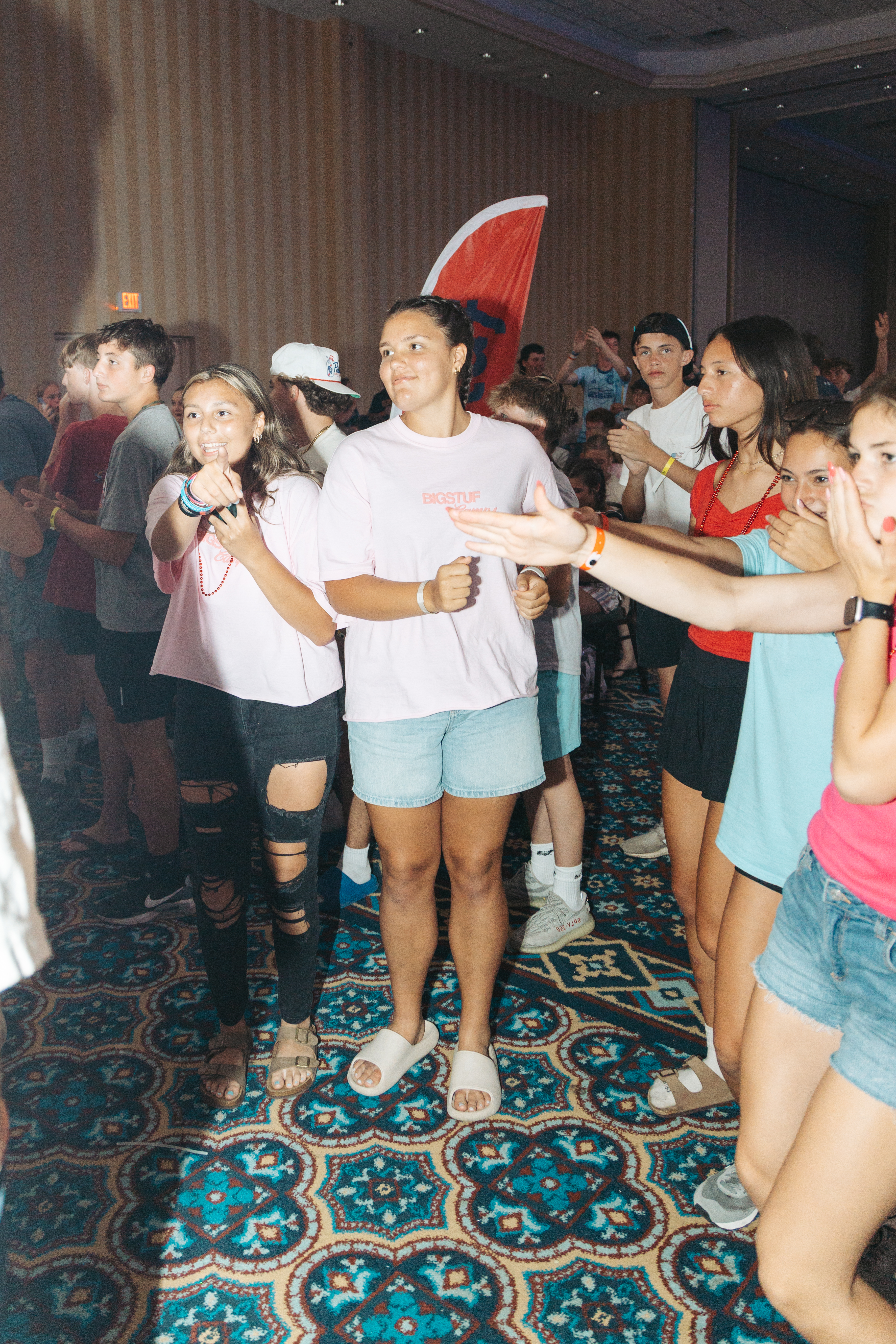 BigStuf students smiling together during an evening camp session