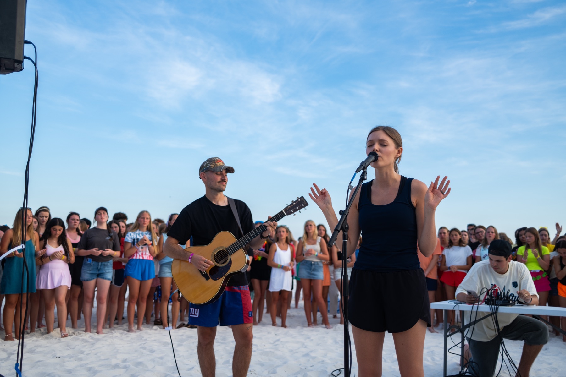Students worshiping together at BigStuf