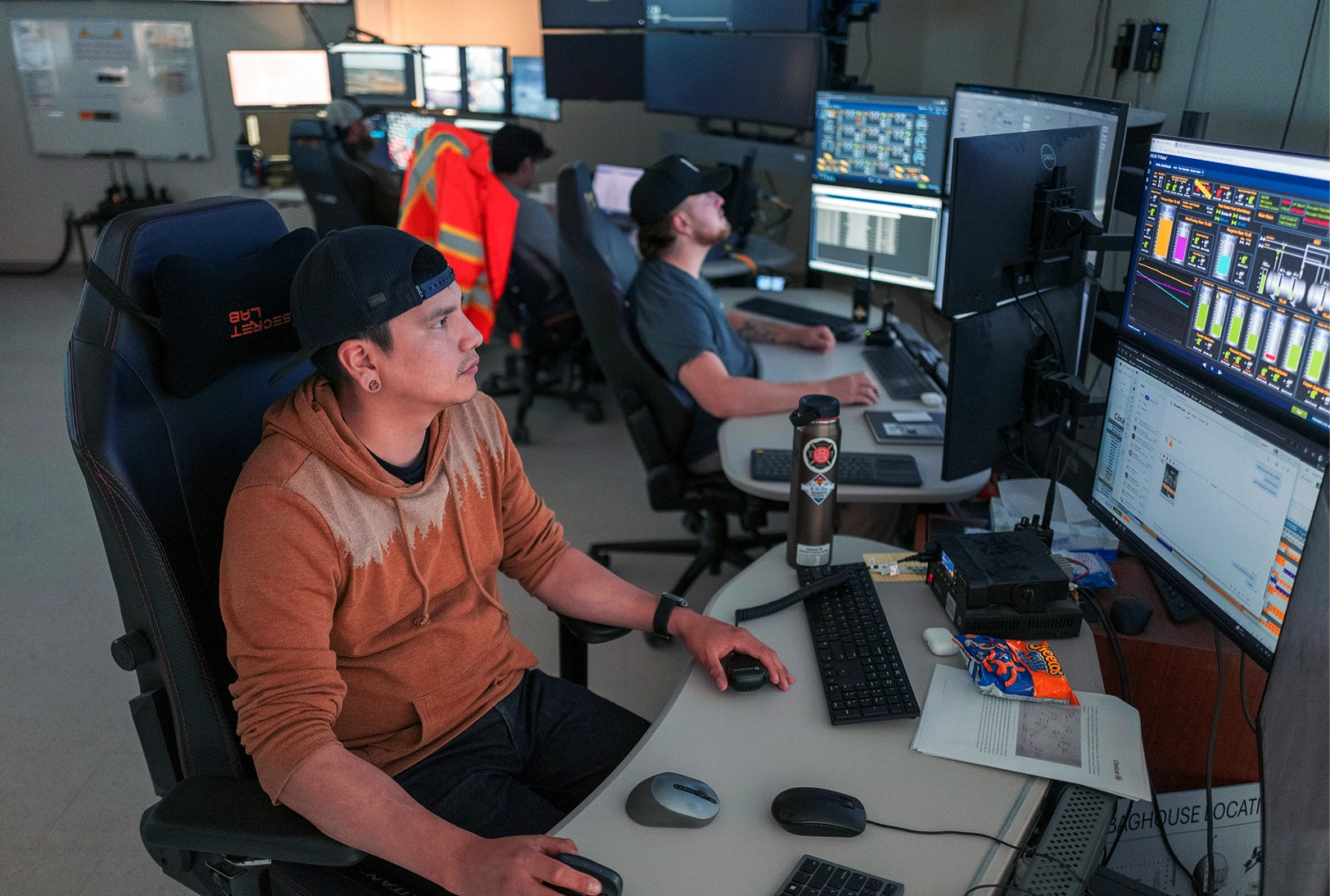 Operators from various backgrounds and disciplines working alongside each other in the integrated control room.