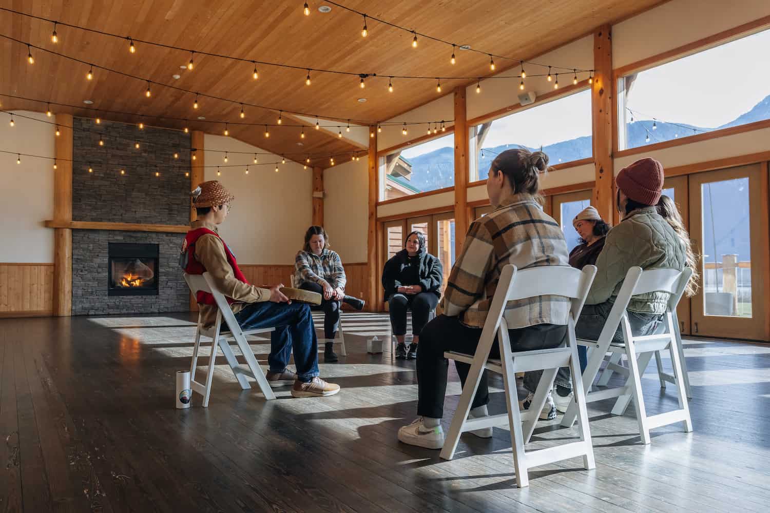 An Indigenous man leading a meditation at the Lodge
