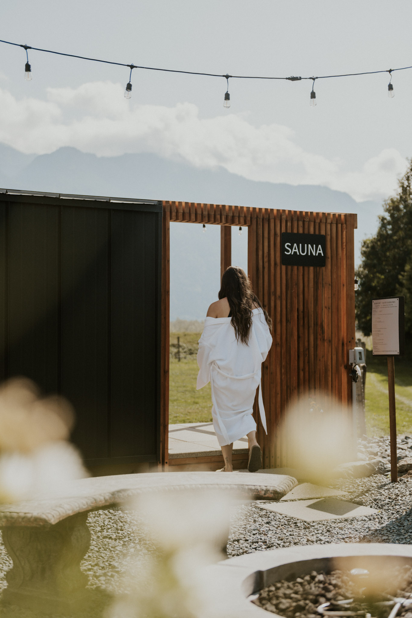 A woman using the sauna at the Fraser River Lodge