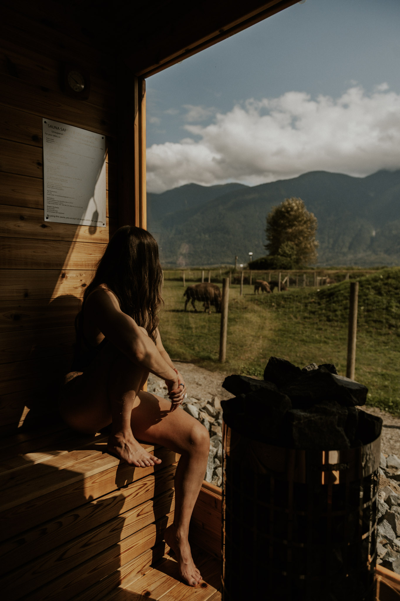 A woman using the sauna at the Fraser River Lodge