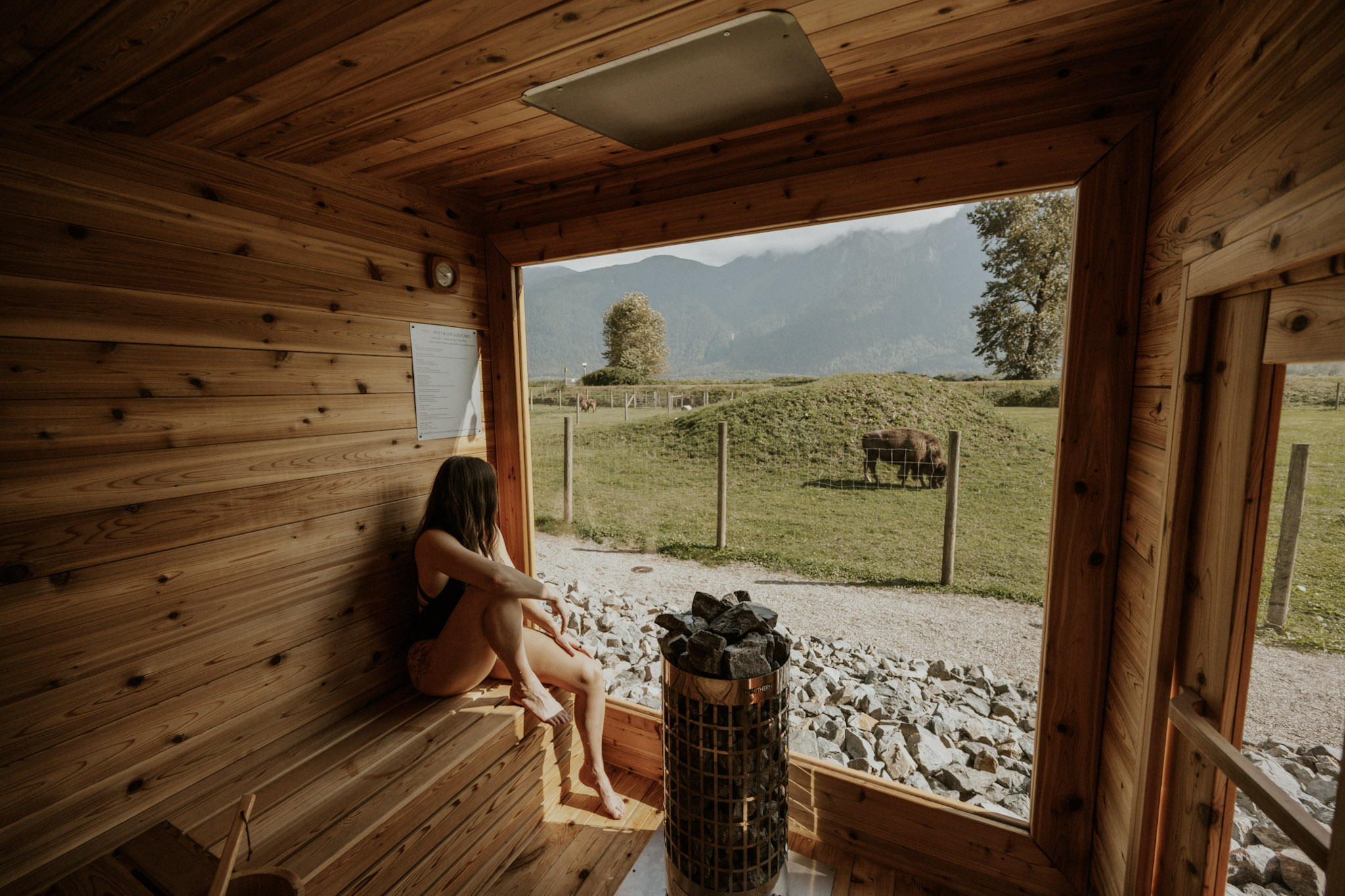 A woman using the sauna at the Fraser River Lodge