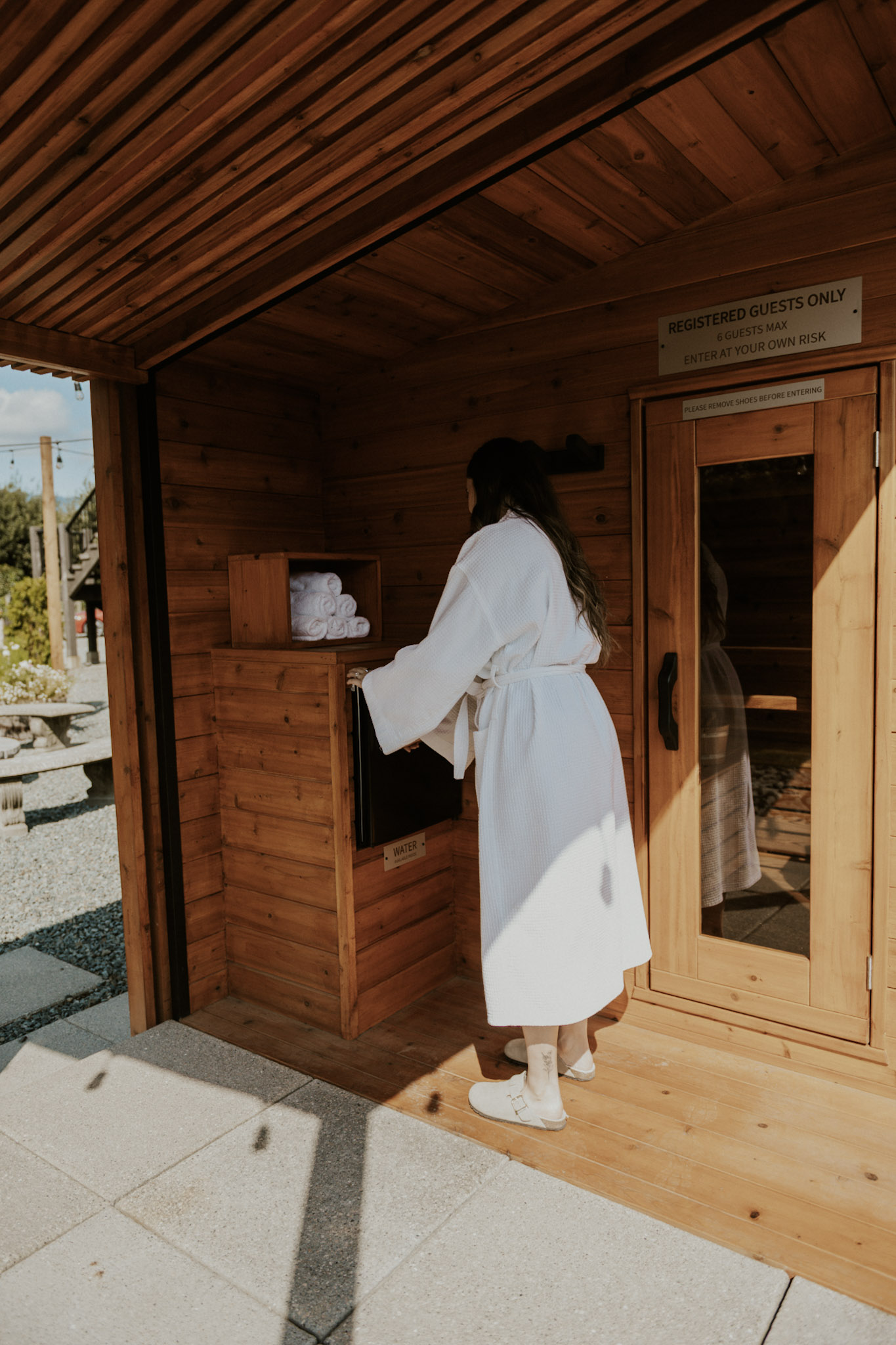 A woman using the sauna at the Fraser River Lodge