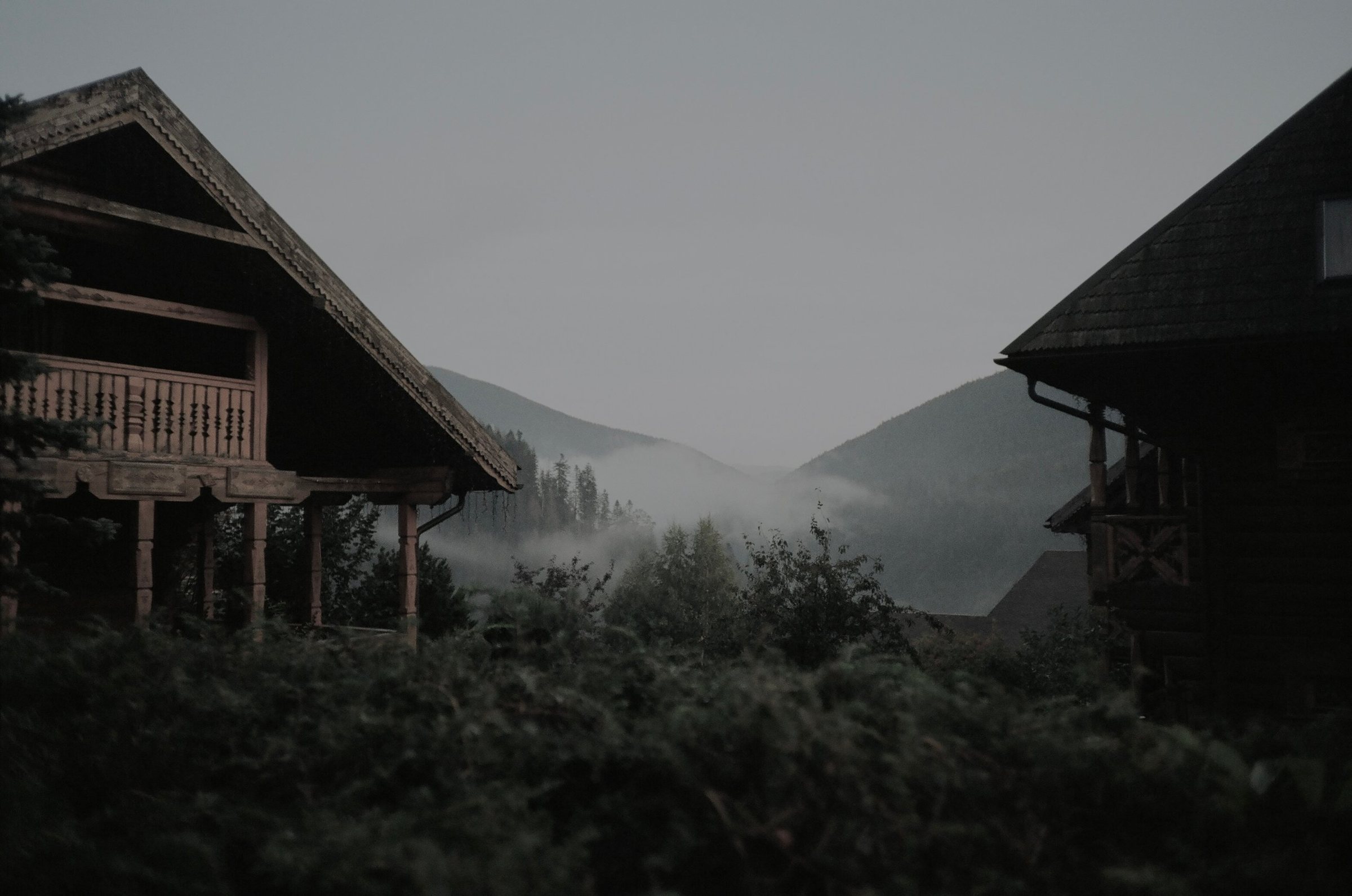 Mountain chalets in the mist