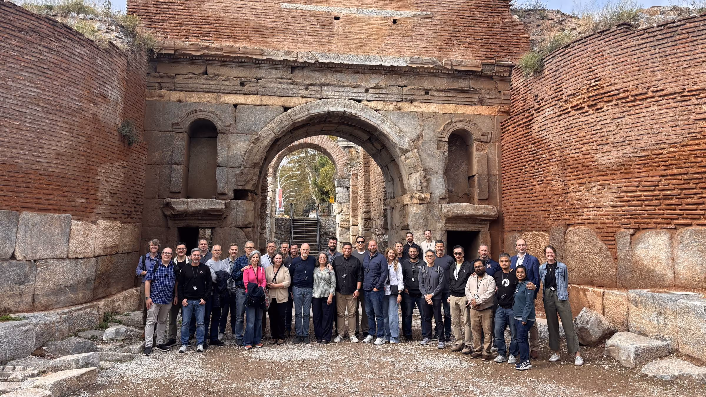 An Enjoy Tours group photo in front of the Roman city gate of Iznik, ancient Nicea