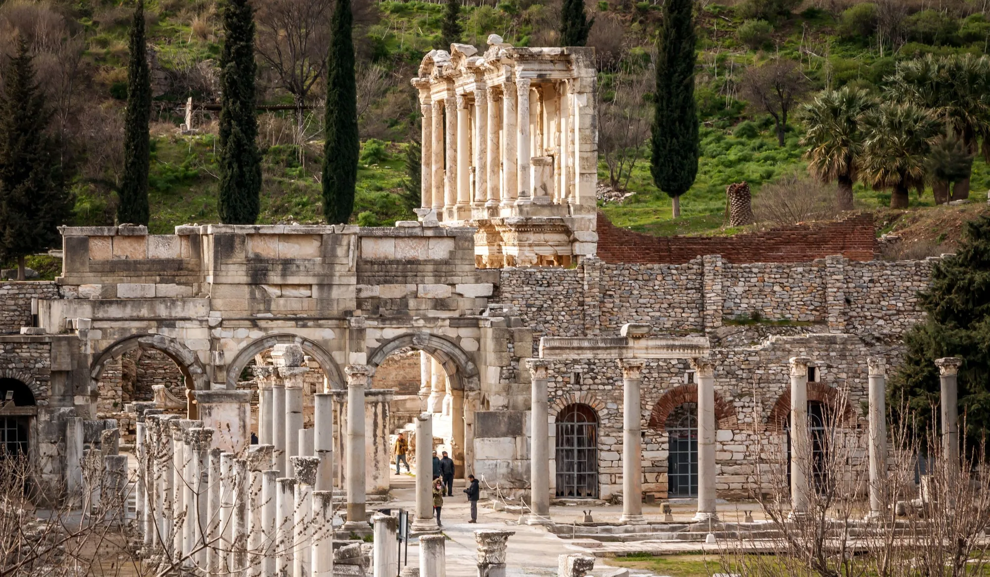 Visitors walking down Curetes Street in Ephesus toward the Library of Celsus
