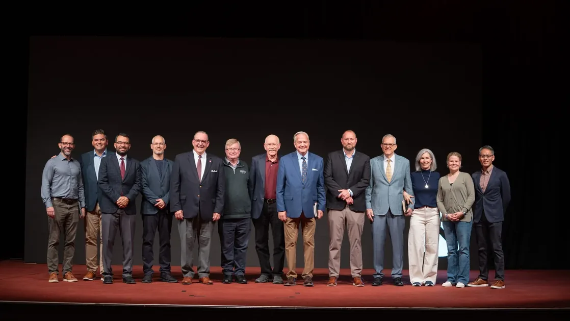 Nicea Conference speakers standing together on stage