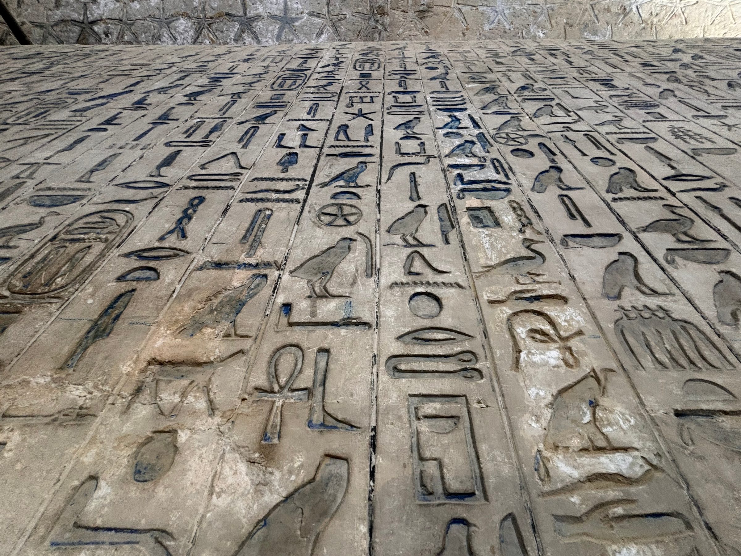 Hieroglyphs carved into stone at Karnak.