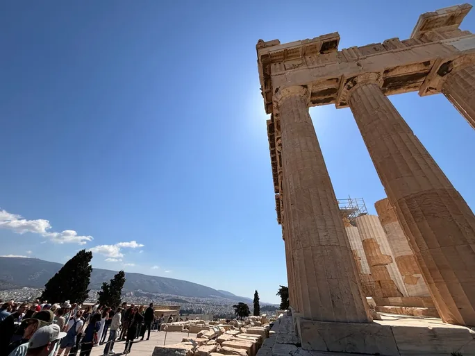 Columns of the Parthenon on the Acropolis, with Athens below.