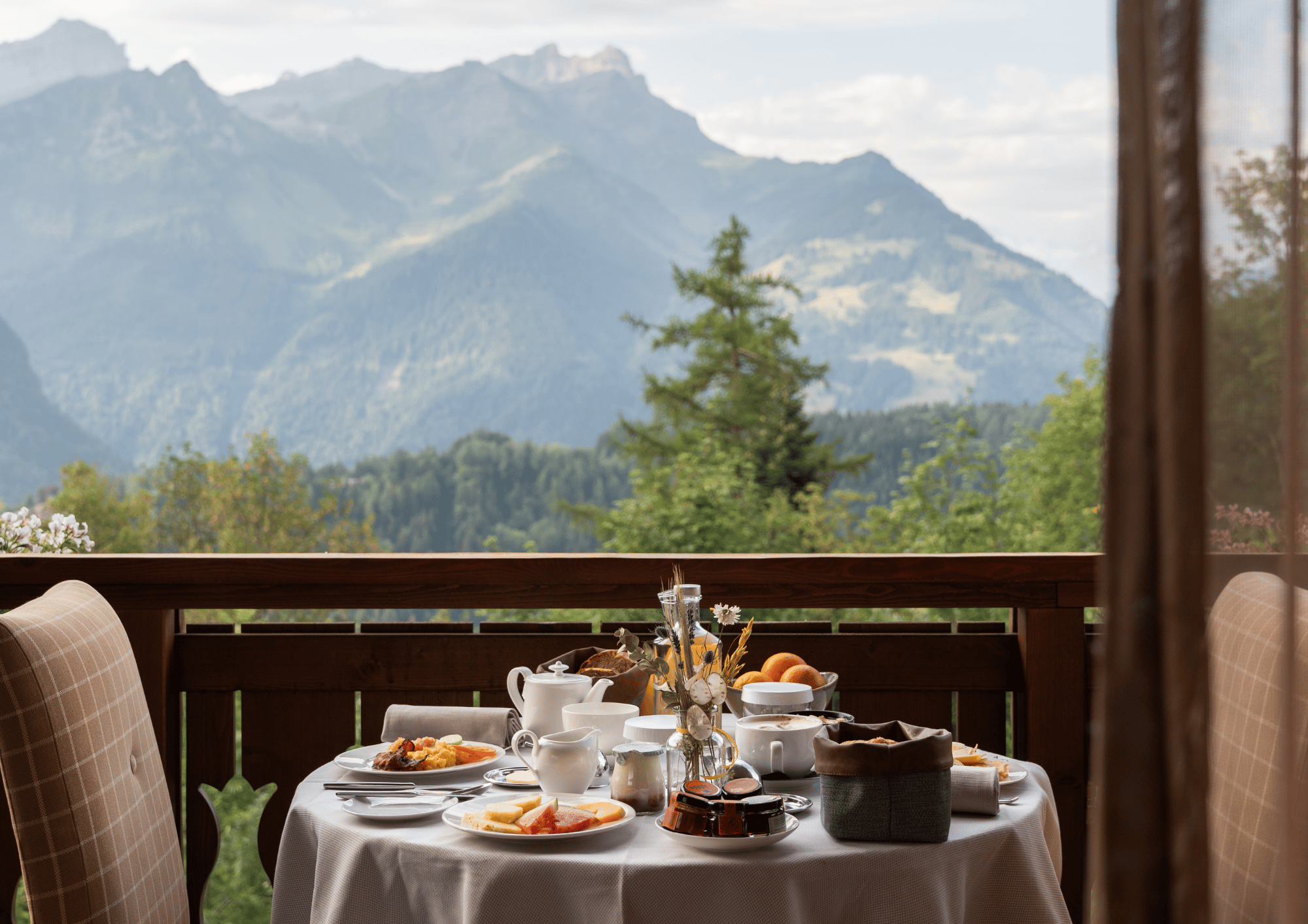 Exterior photo of Chalet Royalp, view from the balcony of the Executive room with mountain views