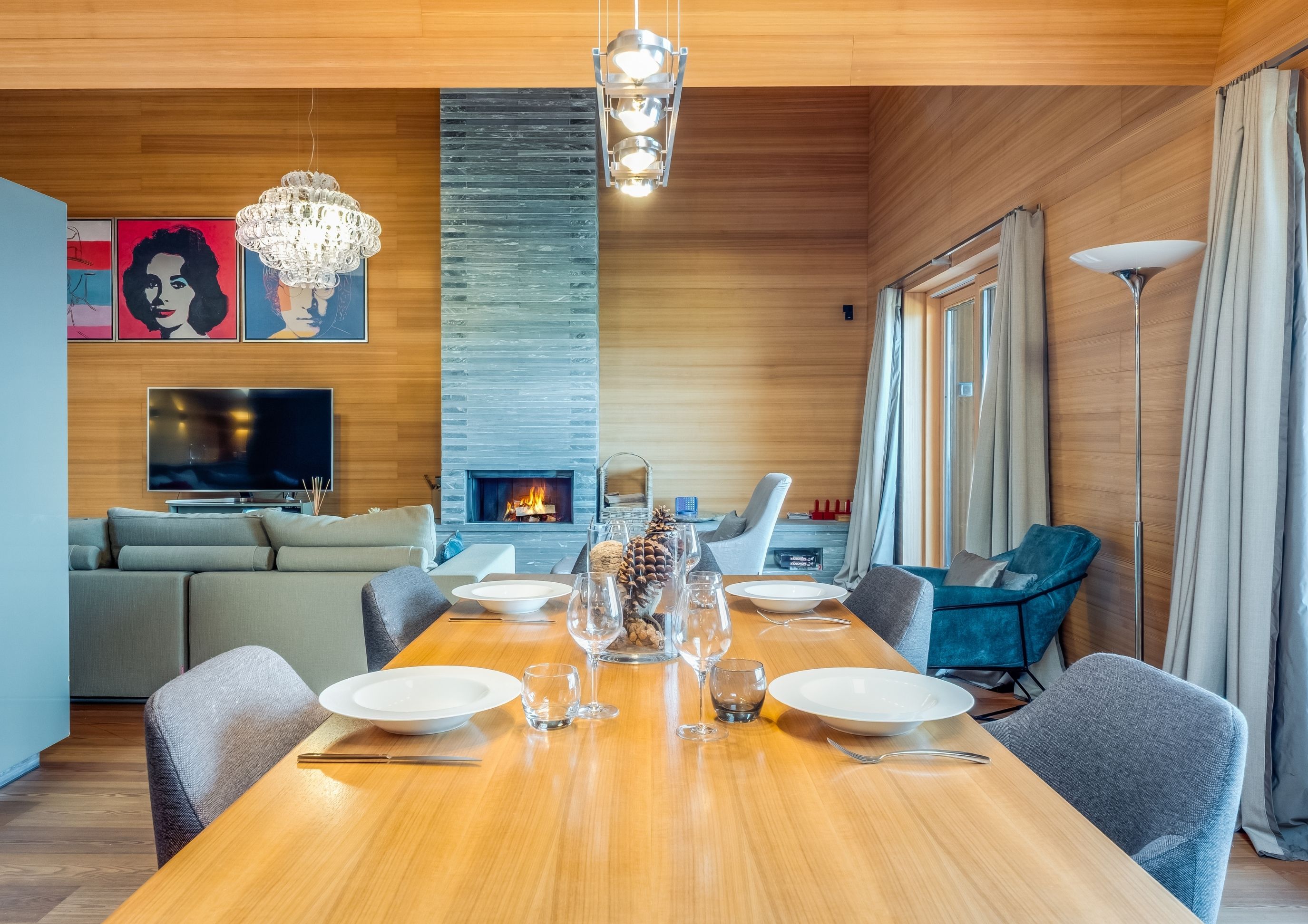 Photo of the dining and living area of the modern penthouse at Chalet Royalp in Villars-sur-Ollon