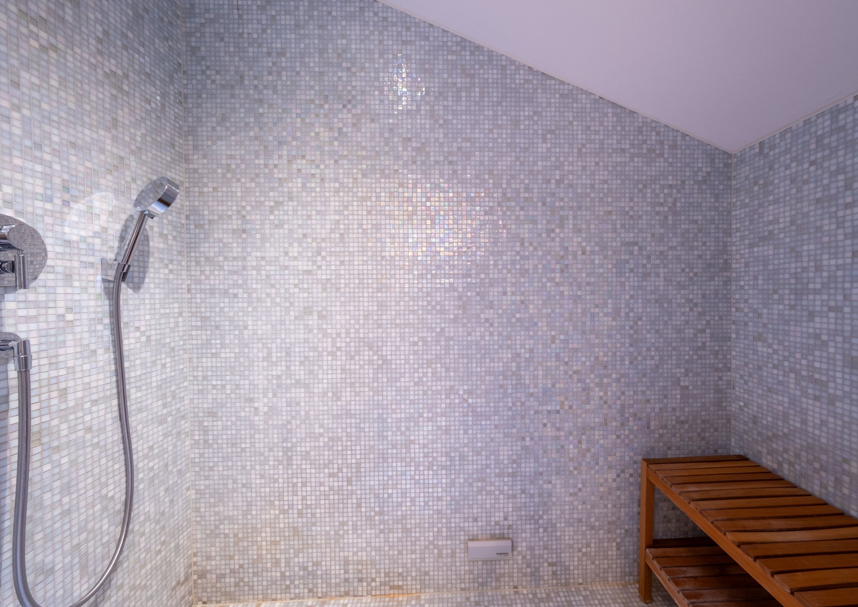 Photo of a bathroom with mosaic tiles