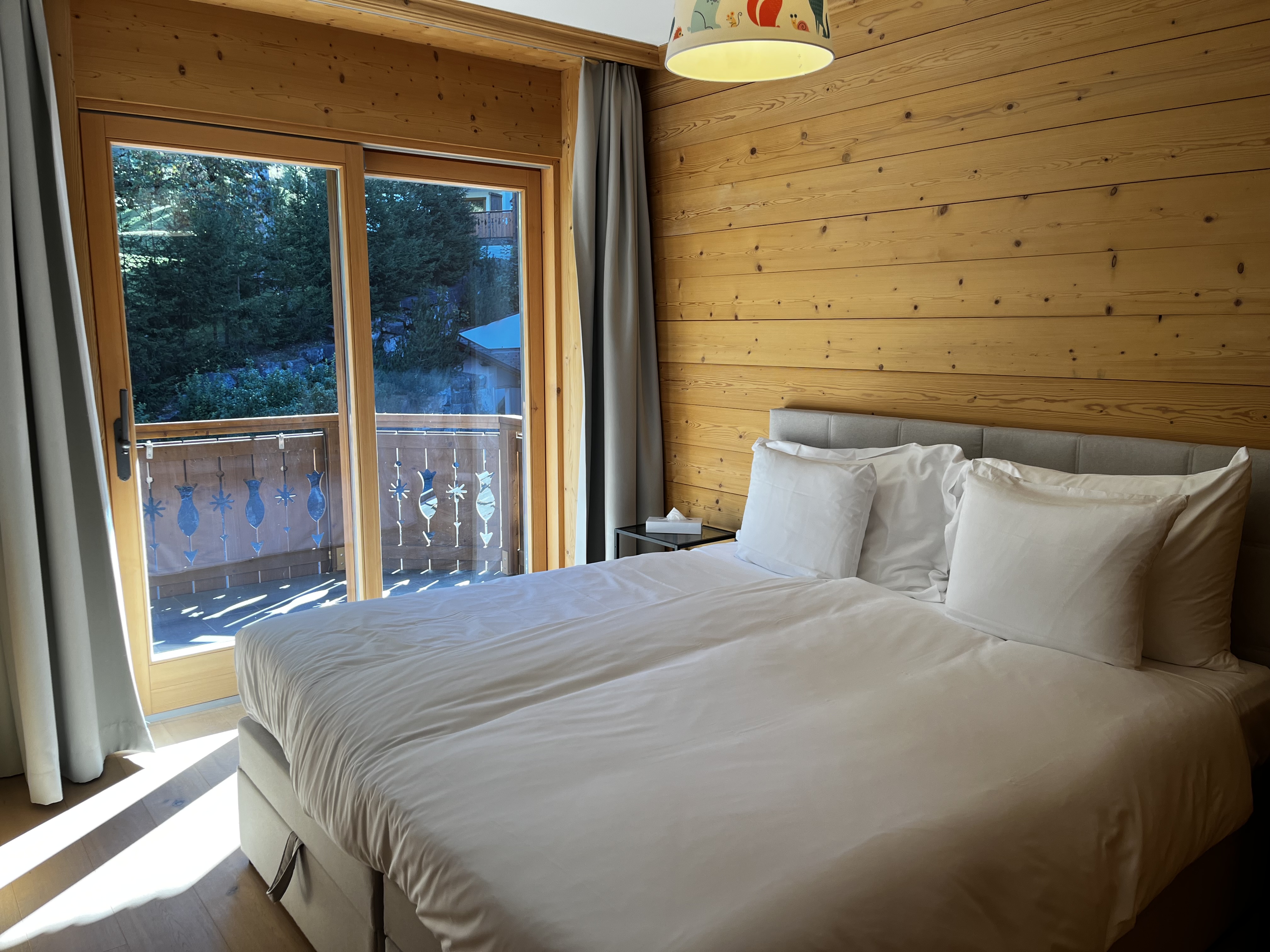 Photo of the bathroom in Chalet Royalp's Executive 1 residence, featuring a washbasin and shower.