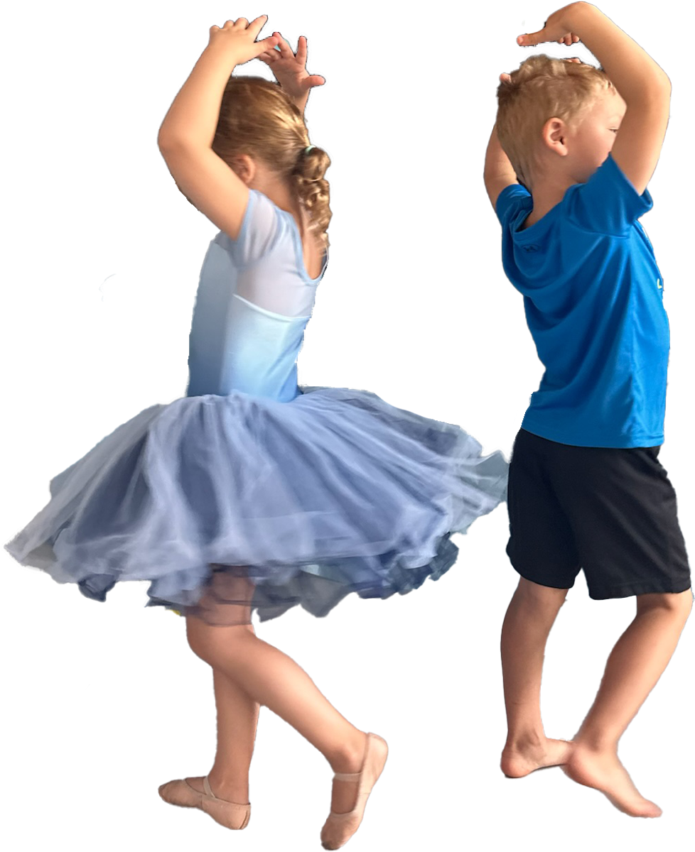 Two young Productions Dance students leaping and posing together