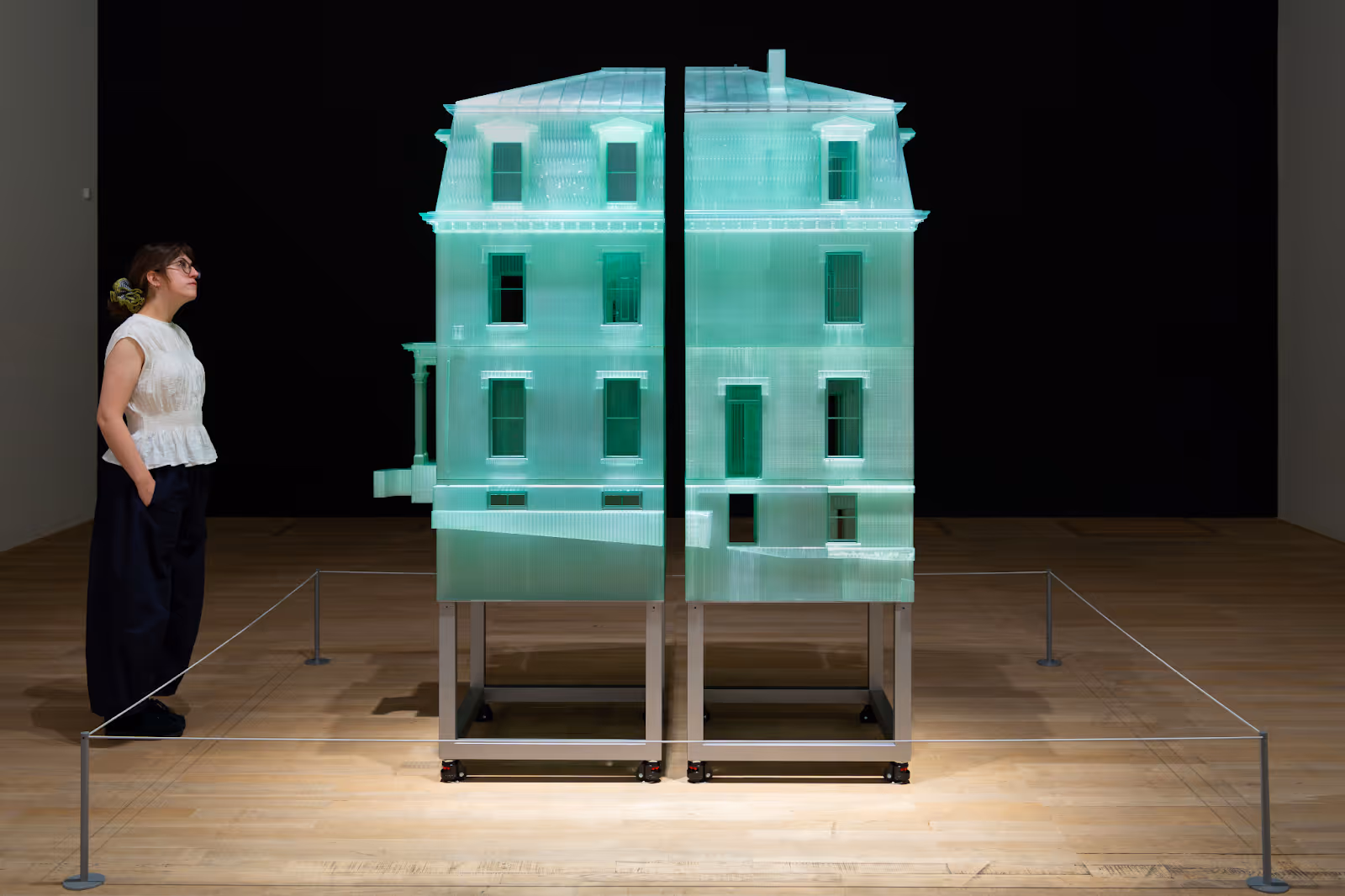 A person looking at an art installation