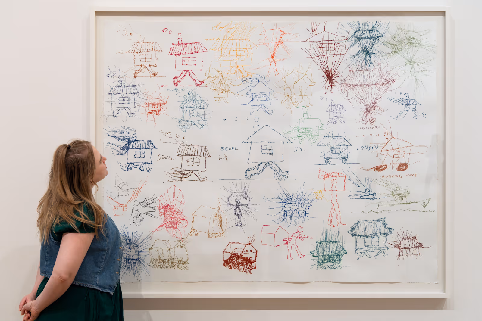 A woman looking at art