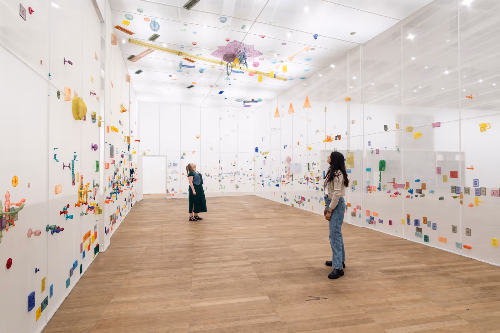 Two women in a gallery