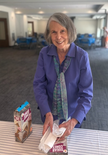 Photo of a woman unpacking ice cream cones