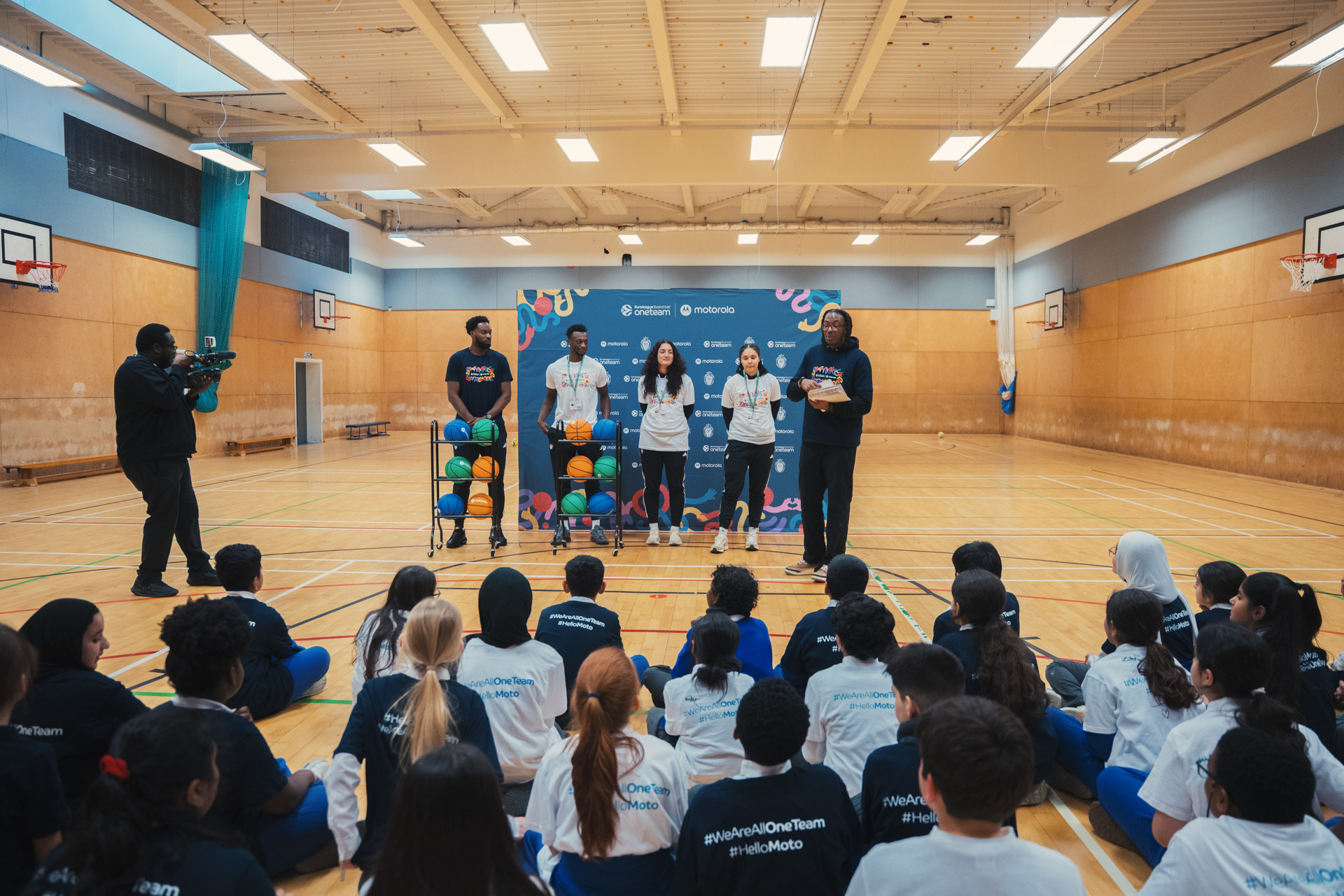 London Lions player speaking to students in a classroom