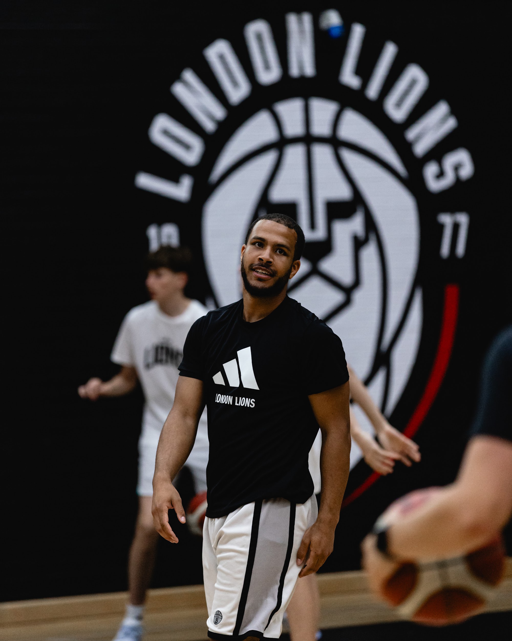 A London Lions volunteer supporting a community session