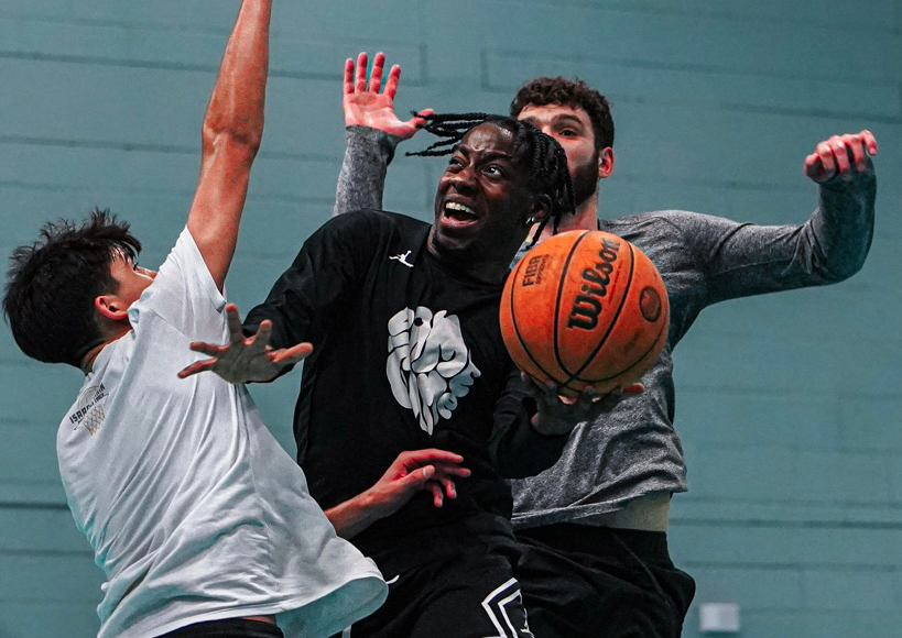 Players competing for the ball at a London Lions open run