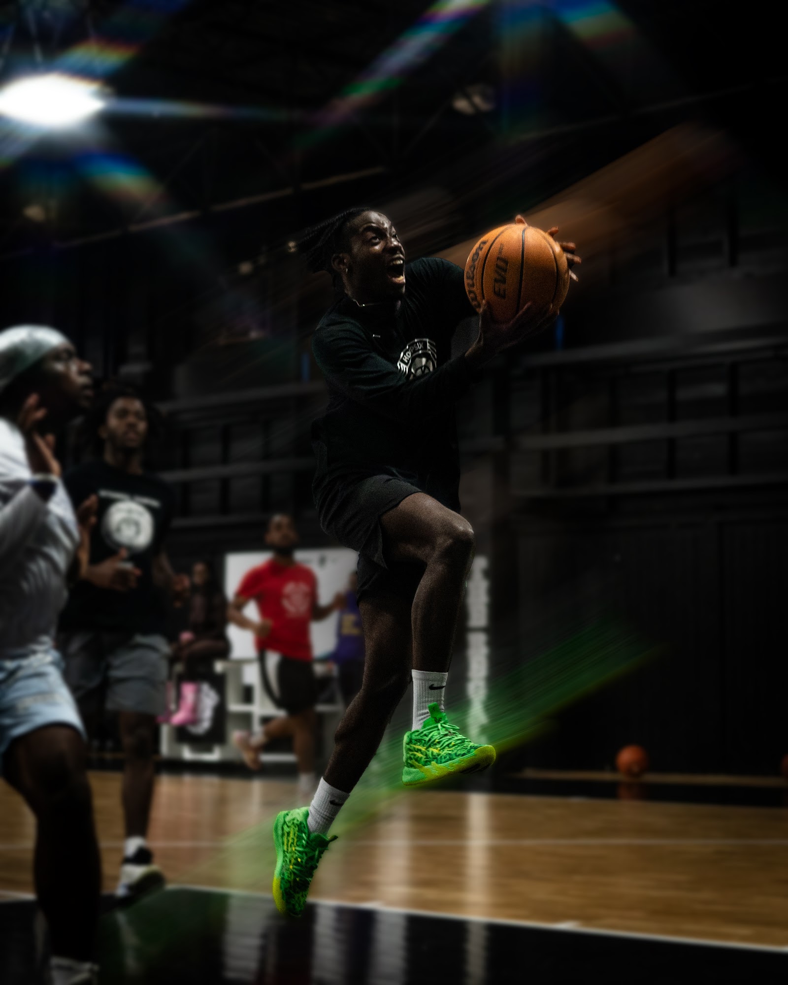 Adults playing basketball at a London Lions session
