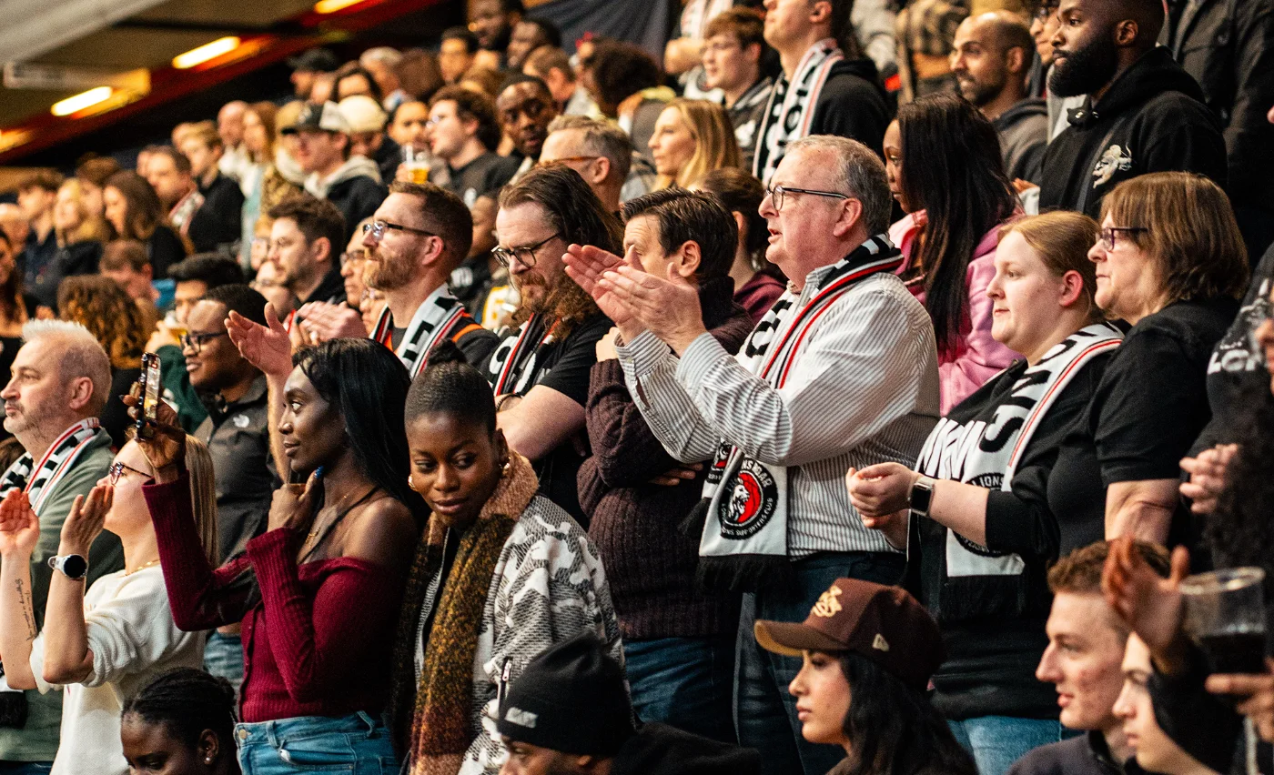 London Lions players signing autographs for fans after a game at the Copper Box Arena
