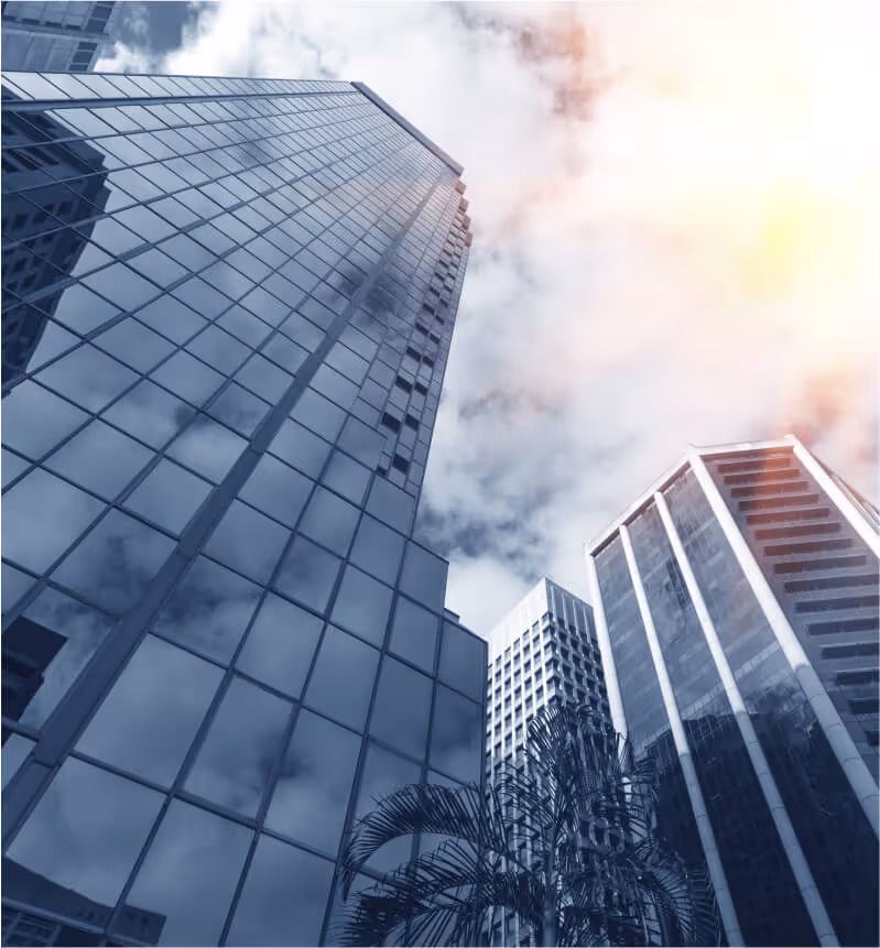 Modern blue glass building viewed from low angle