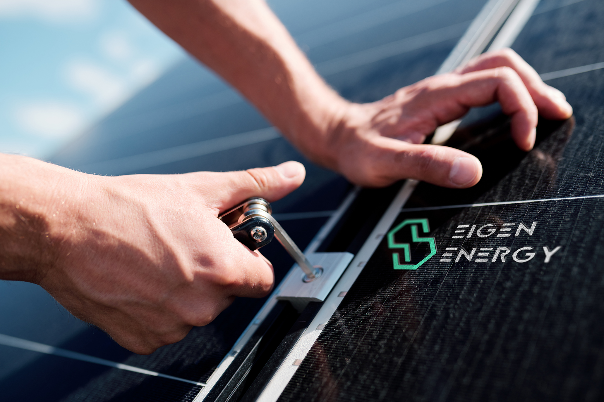 Technician fitting a solar panel