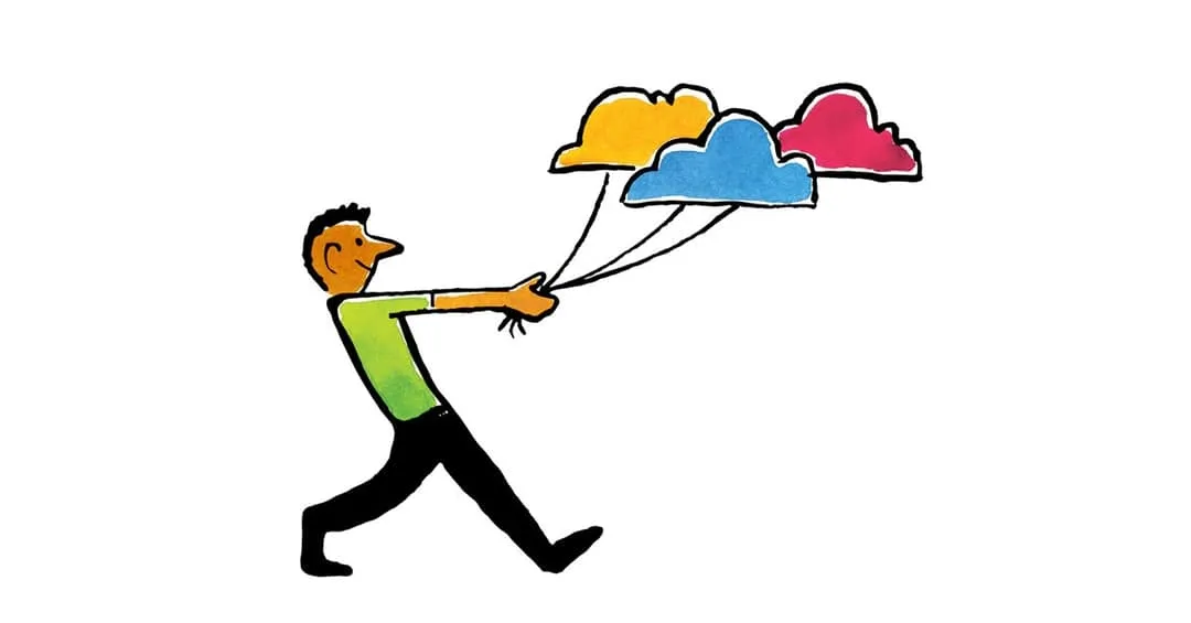 Un hombre sosteniendo globos de nube 