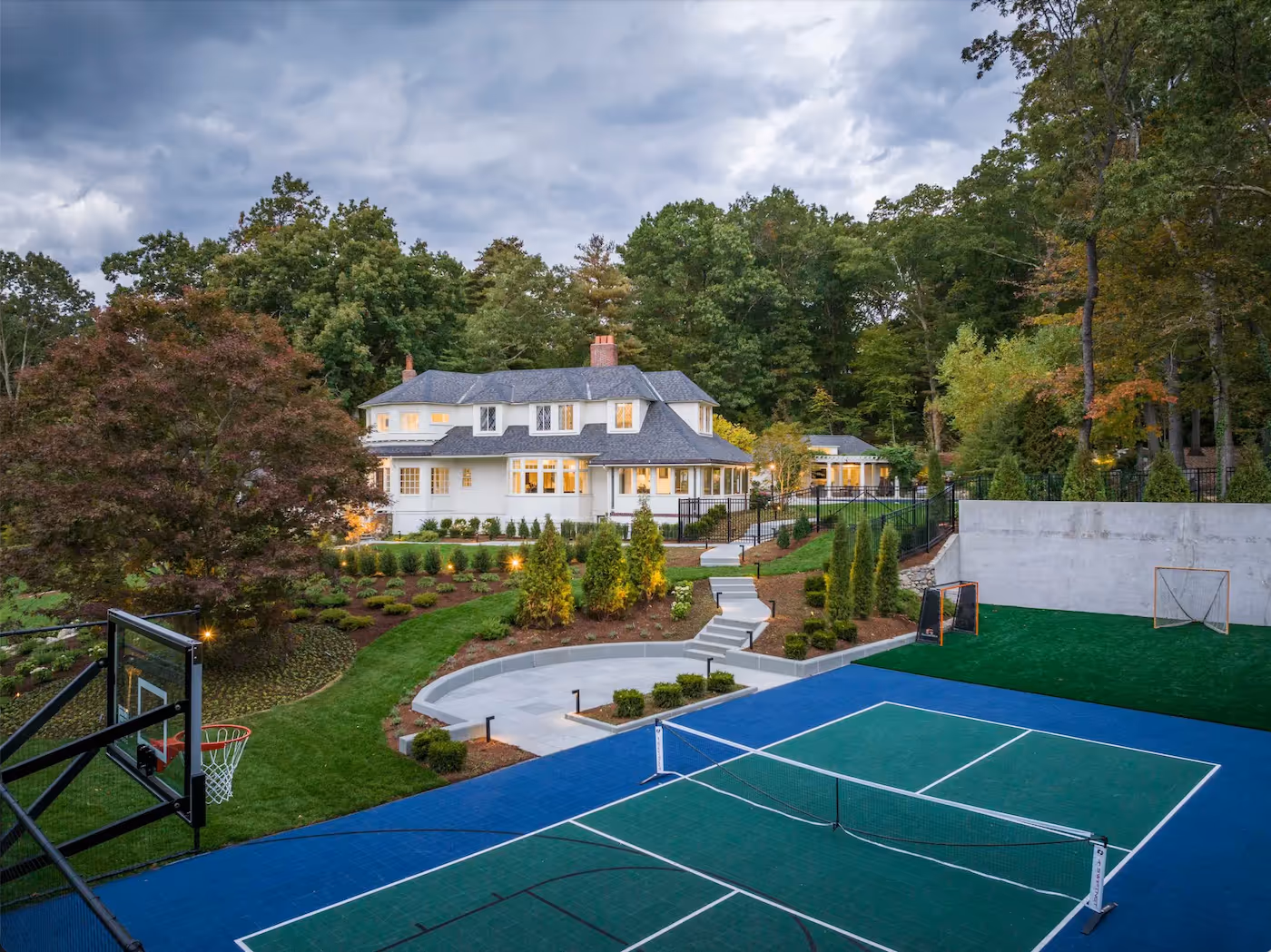 Custom backyard basketball court installation in Asheville with professional surfacing and landscaping