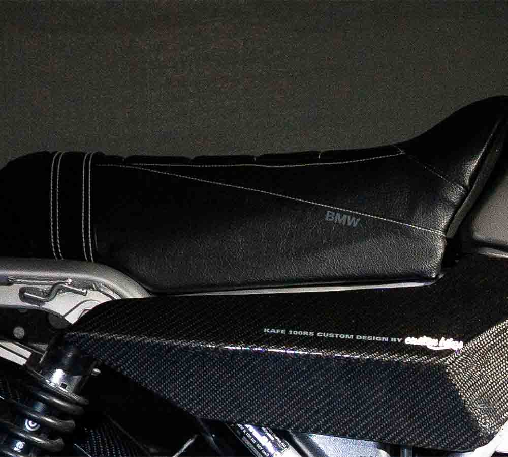 BMW k100 Seat Normally in the custom builds the bottom angle of the tank is used as a guide to extend the seat position, leading the eye on a straight uninterrupted path. In this case it would have made the seat too high and wasn’t the look I was going for.This was quite problem I was faced with and did take some time to figure this out. The solution I came up with was to make the seat flow from the tank downwards at an opposing angle but still making it look correct as if it came from the factory. To maintain a clean eye line from the tank through the seat a stitching line was sewn into the seat giving the eye a line to follow.