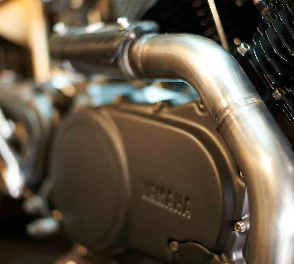Custom exhaust design for bike build Yamaha xv750 Virago by Custom bike builders DS engineering