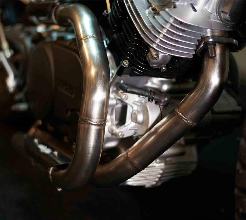 Custom exhaust design for bike build Yamaha xv750 Virago by Custom bike builders DS engineering