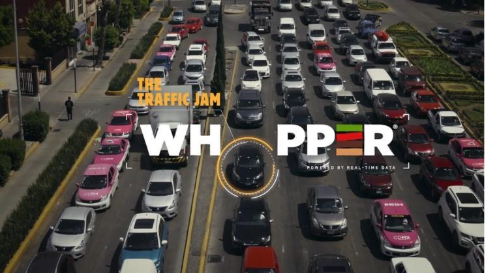 A traffic jam with cars in the middleAI-generated content may be incorrect.