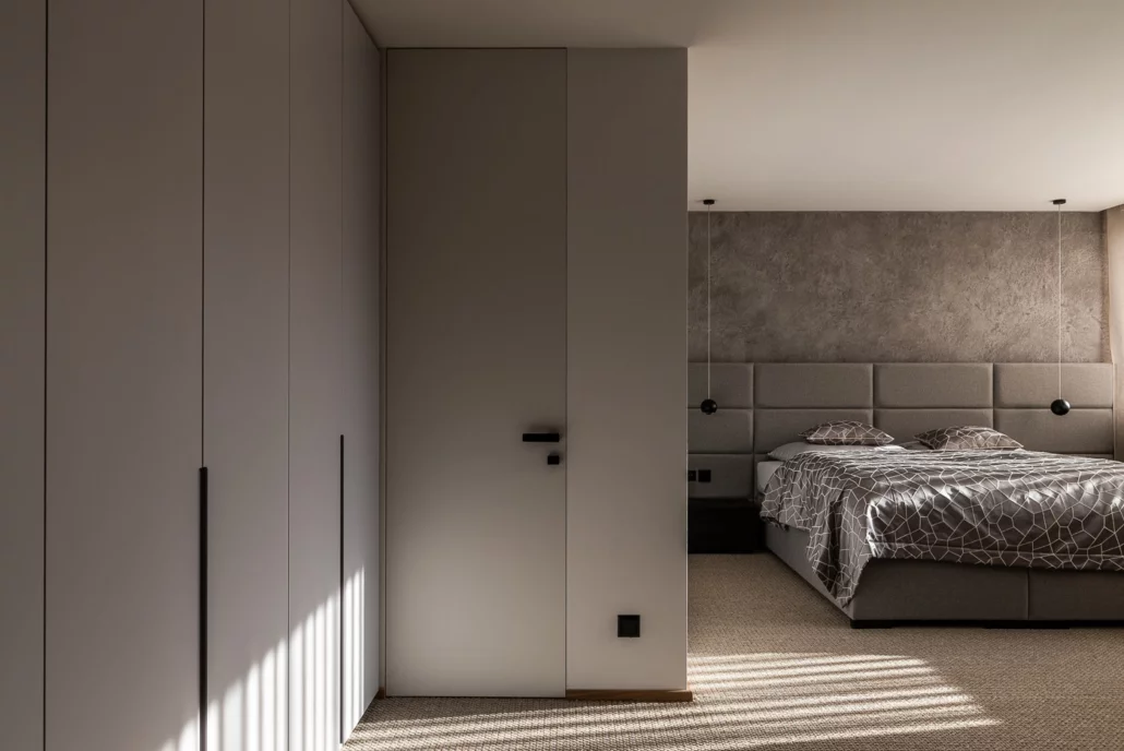 Master bedroom with a full-height Dorsis Fortius frameless door with invisible frame.