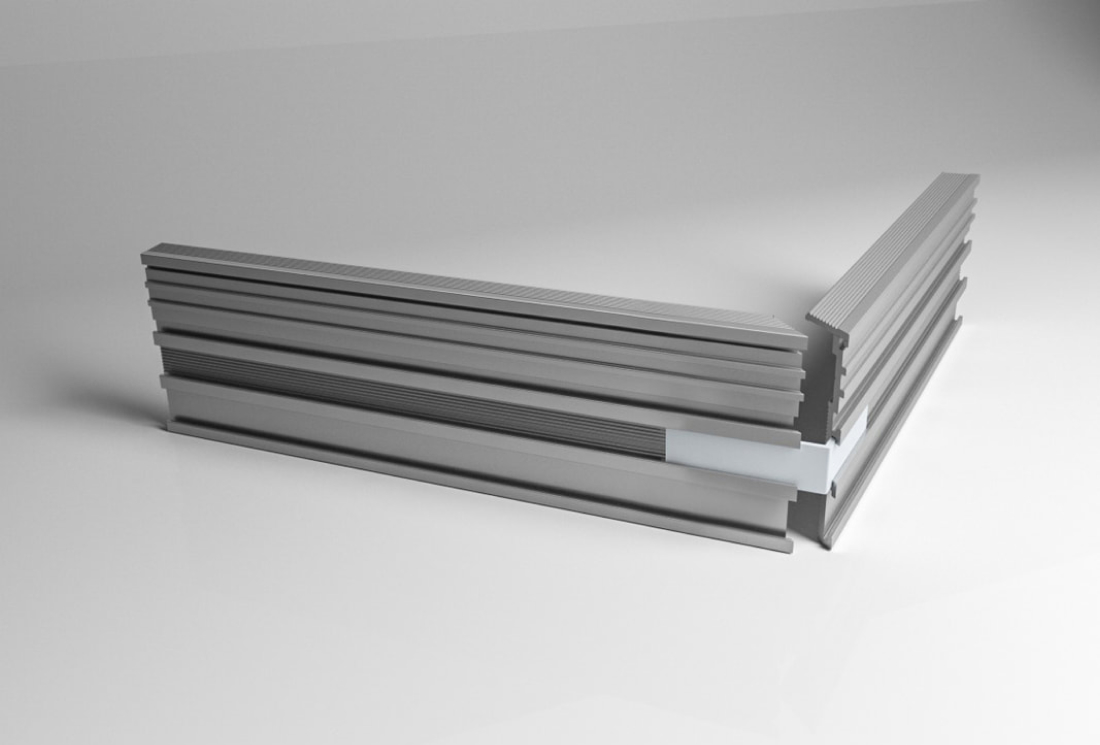 Inside corner component of the flush baseboard system Dorsis Linus 15 with a corner bracket for easy installation at the job site.