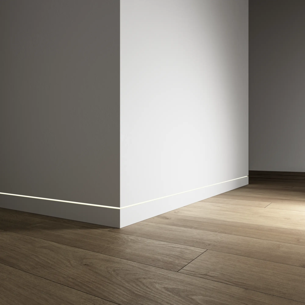 Dorsis Linus flush baseboard with LED strip lighting channel, flush base trim moulding in white.