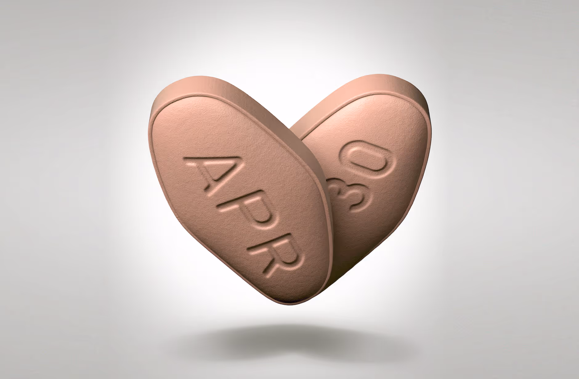 Two brown, oval-shaped pills with embossed text 'APR' and '30' shown close together against a light background.